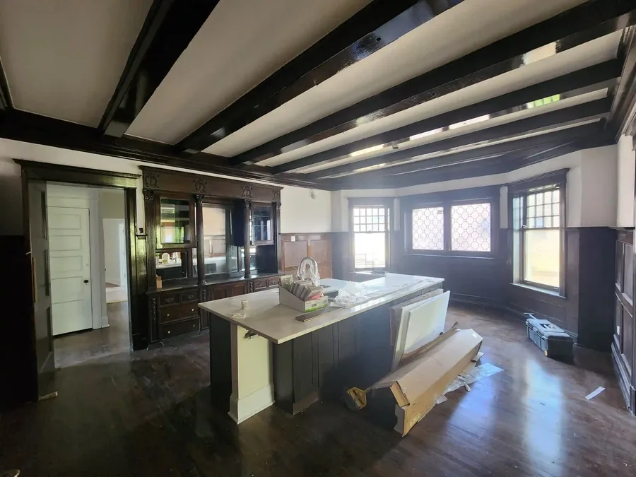 Craftsman dining room in a historic home prepared for period wallpaper