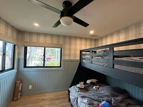 Plaid accent wall wallpaper installed in a residential San Antonio bedroom